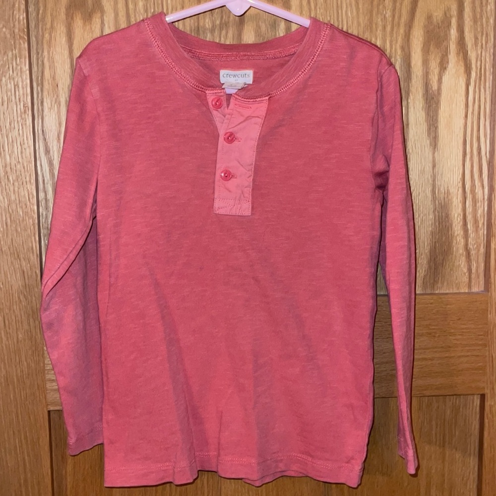 Boys size 4/5 Henley shirt. Never worn. Burnt orange color.
